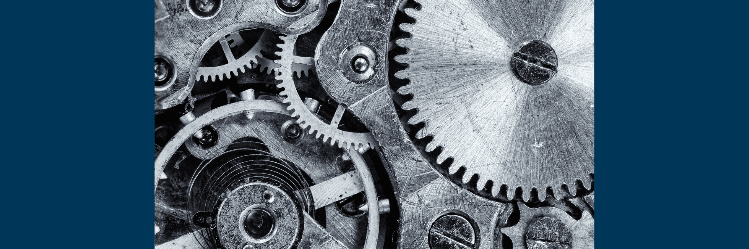 Close-up of interlocking clockwork gears symbolizing precise coordination and system processes.