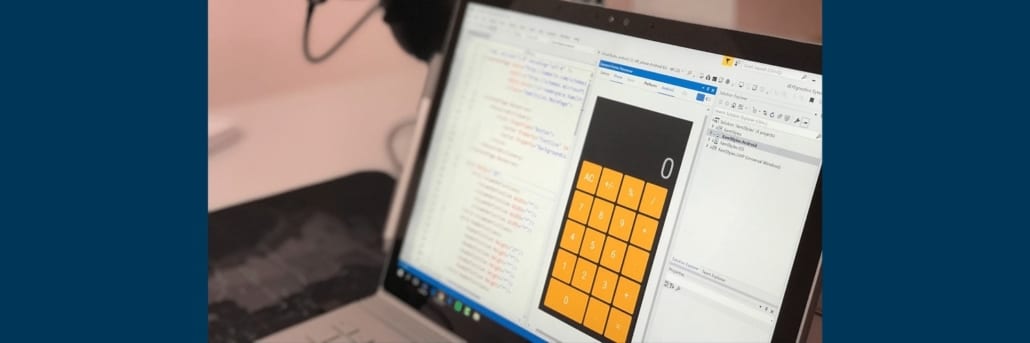 Calculator and html code on a computer screen during data analysis