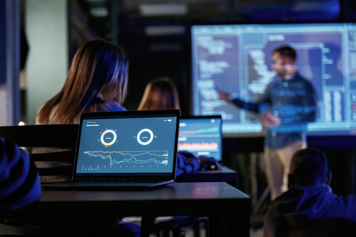 Security team analyzing threat exposure data and vulnerabilities to reduce enterprise cyber risk.