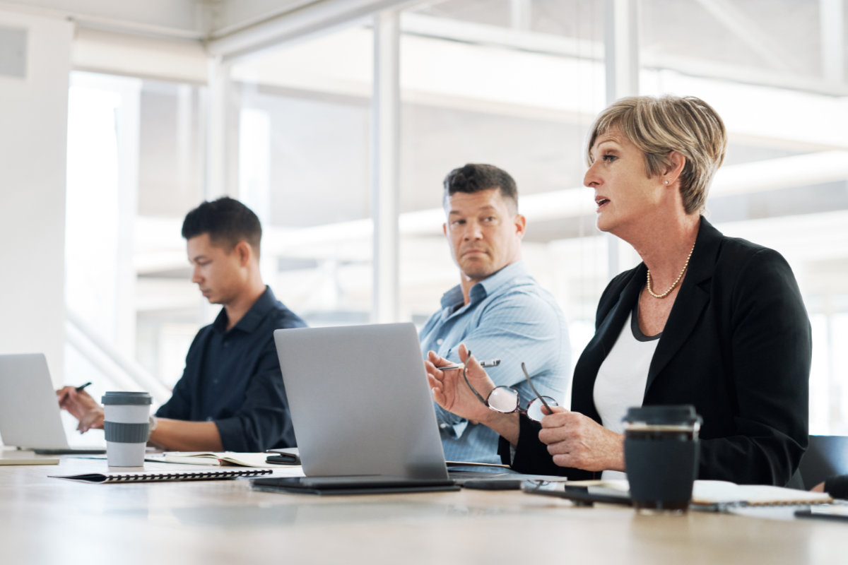 vCISO leading executive discussion on cybersecurity strategy, risk management and compliance.