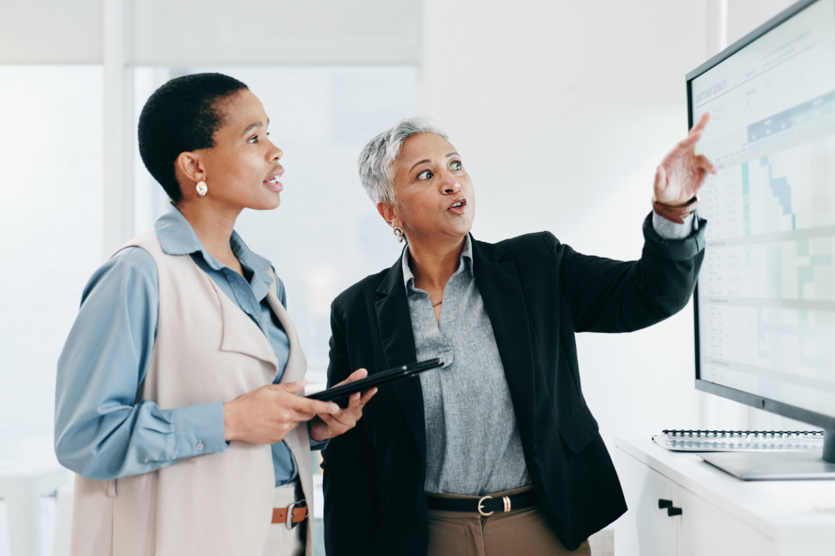 Security professionals analyzing vulnerability data using the Qualys platform for risk and exposure management.