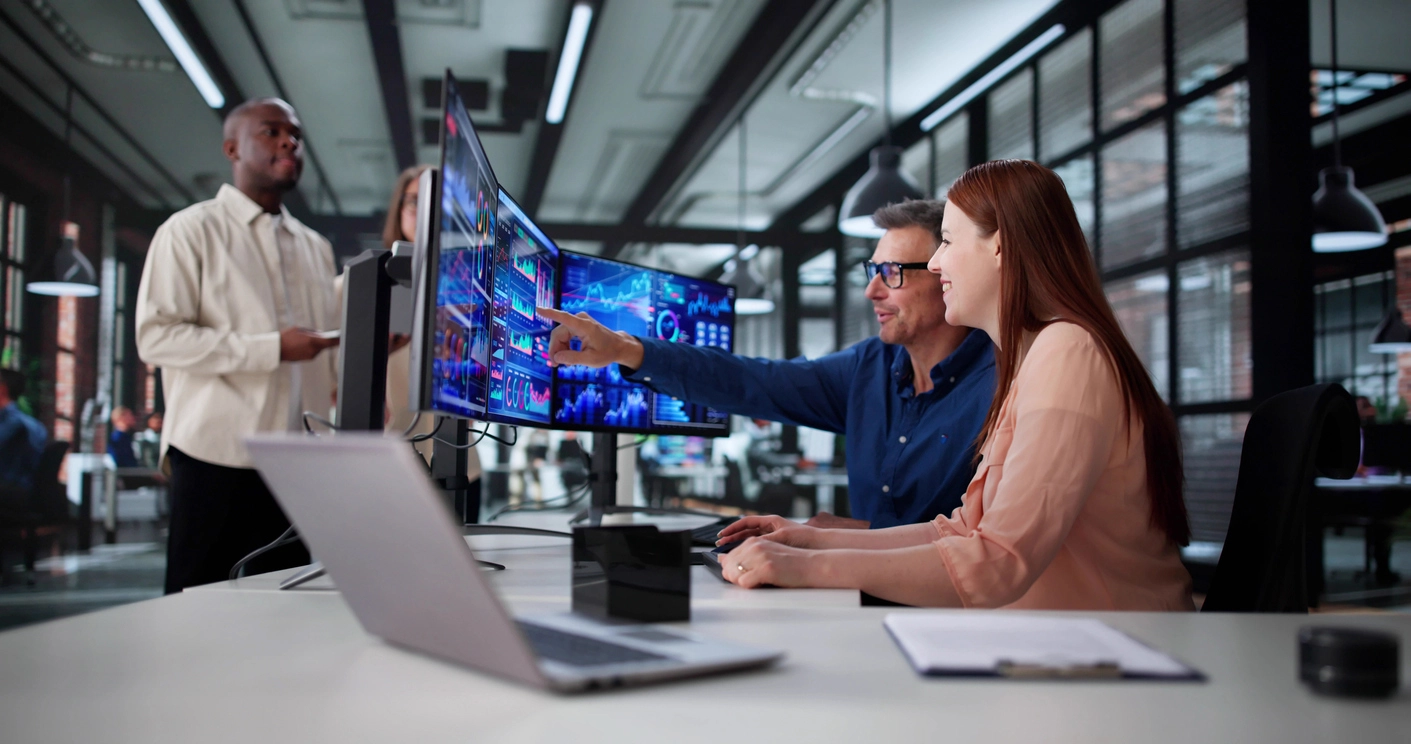 Security analysts monitoring autonomous cyber defense dashboards.