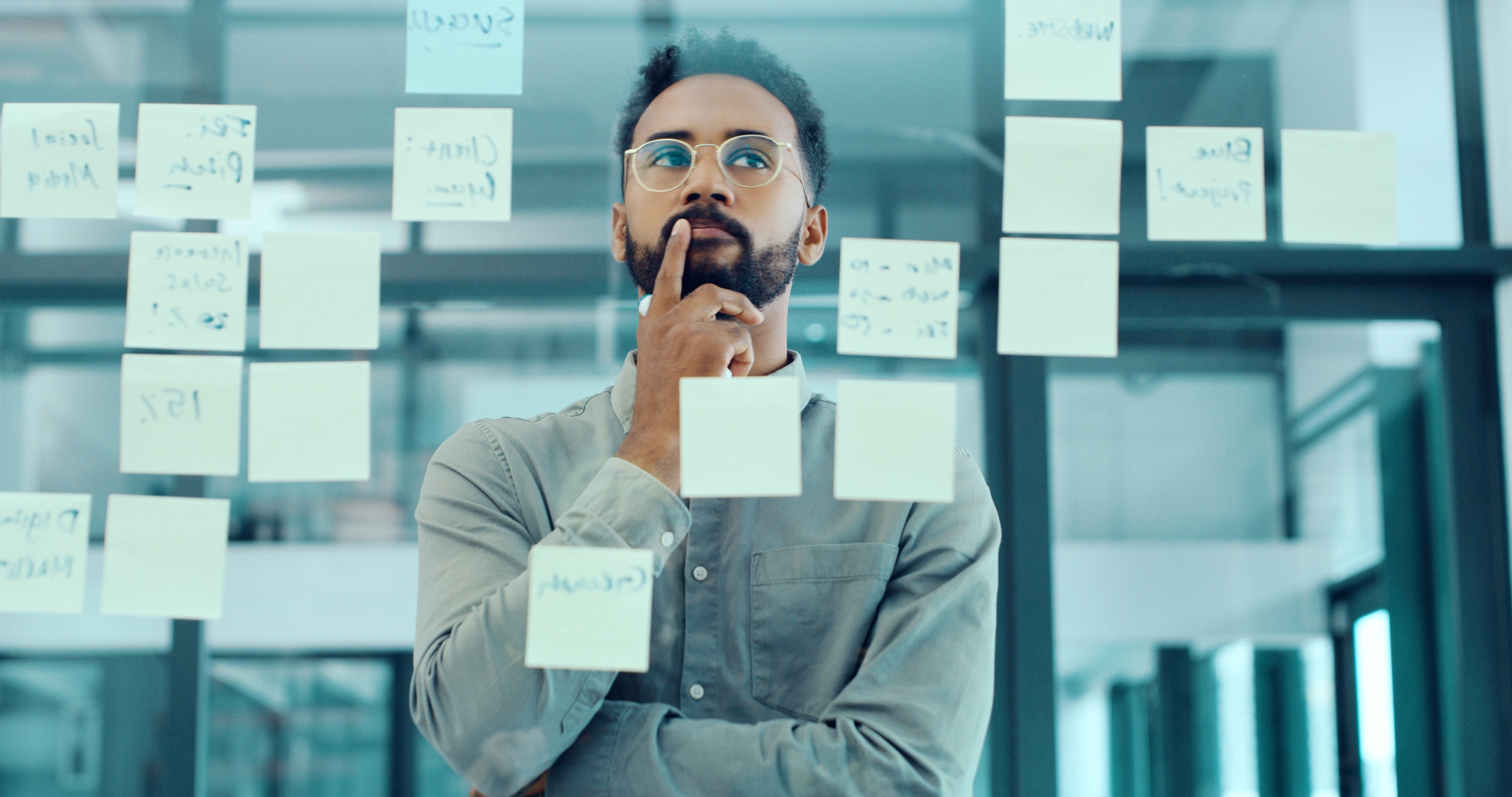 Cybersecurity professional planning an autonomous cyber defense strategy using workflow notes.
